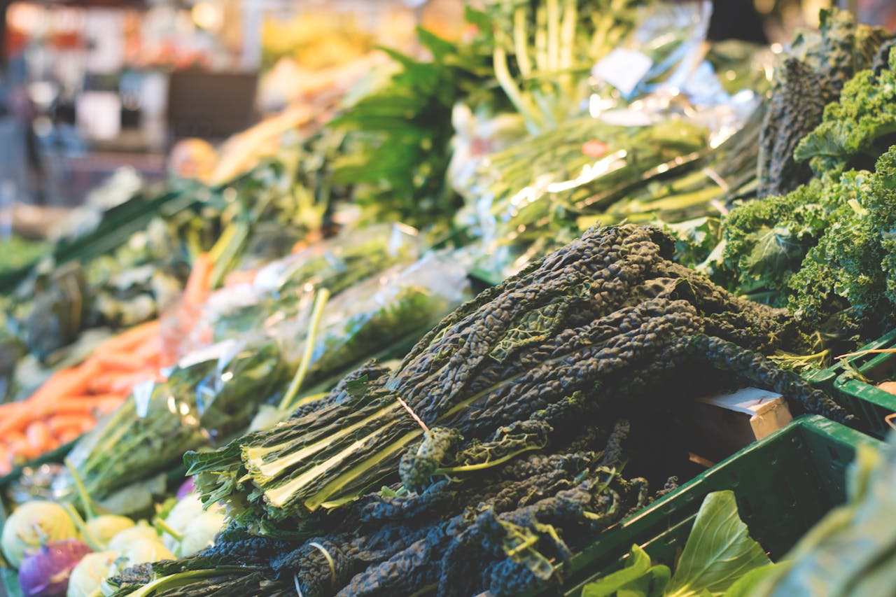 contact-img A vibrant display of fresh organic vegetables at a local market stall, showcasing healthy eating.